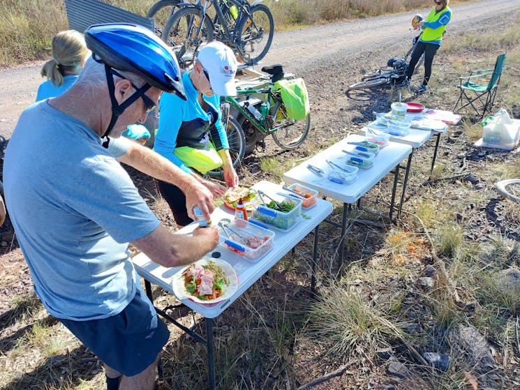 Cyclist stopped for a meal break