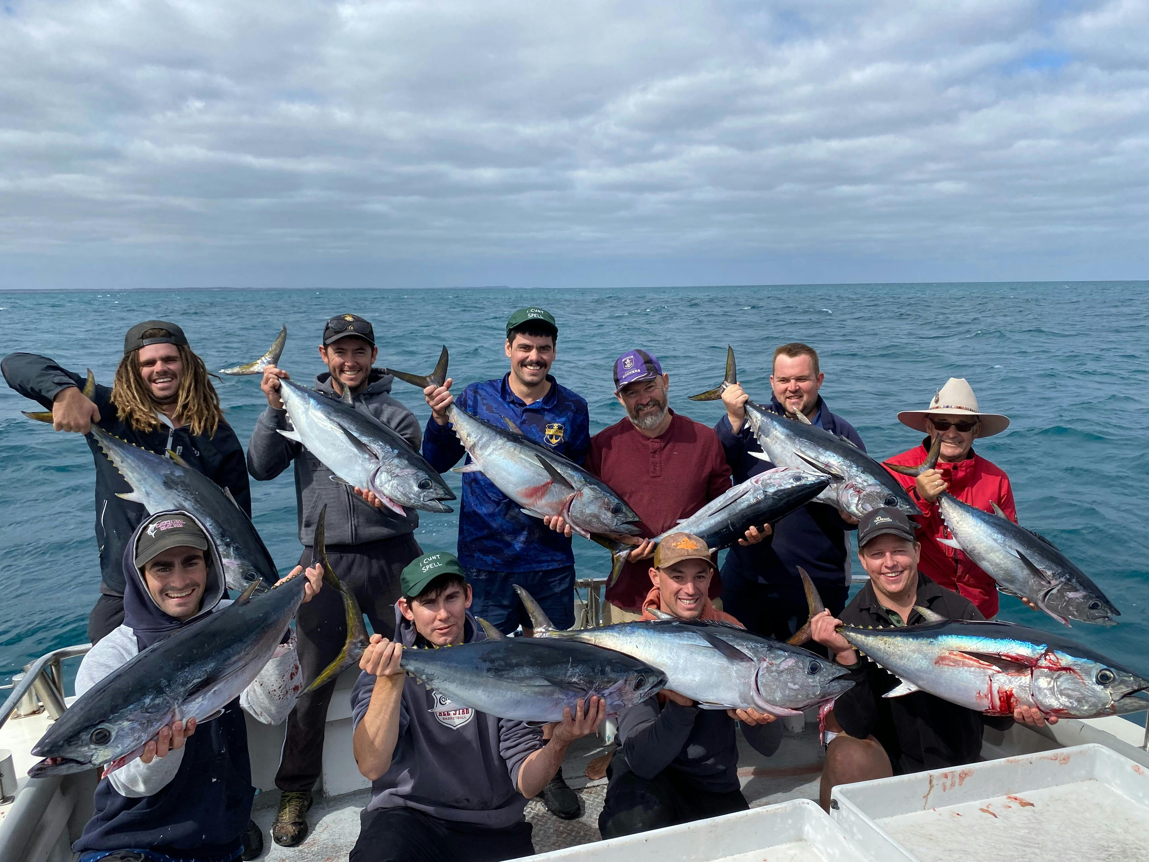 Reef Encounters Fishing Charters clients with tuna