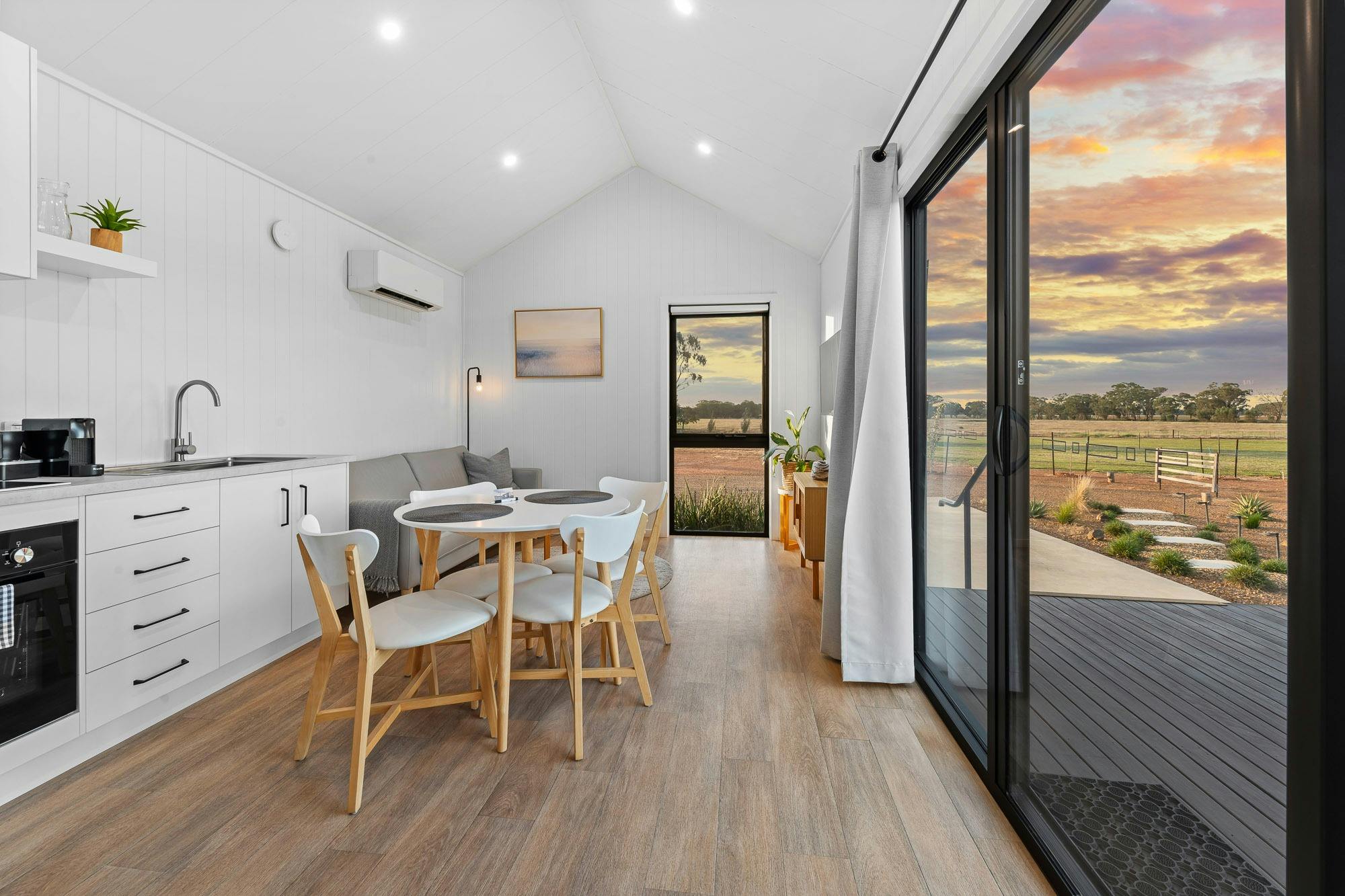 'The Ophir' one bedroom pod.  Kitchen, dining, living space, private deck, wide open views.