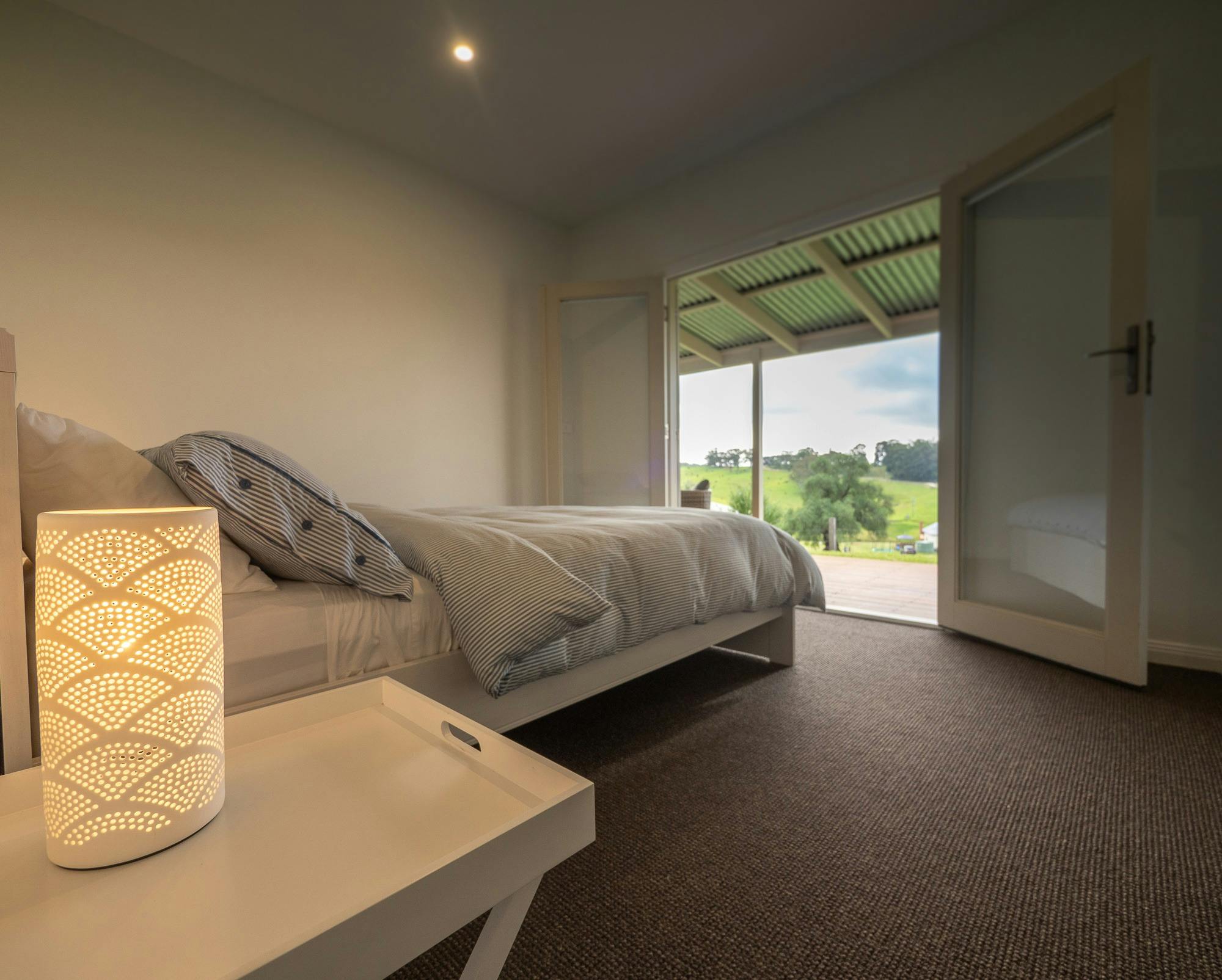 With French doors that open to verandah, garden and views