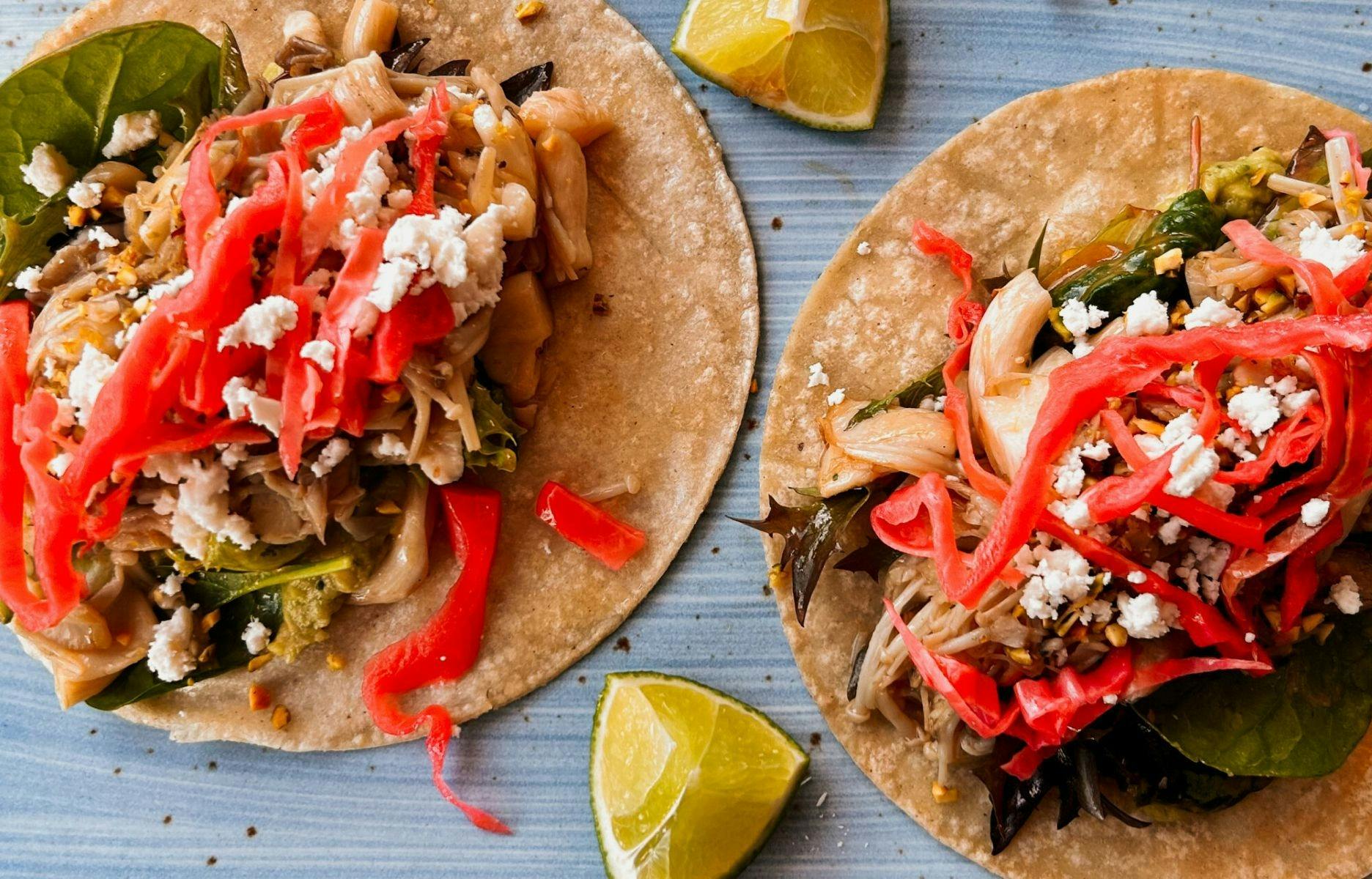 Tacos image with mince and lime on the side at  El Corazon Mexican Shellharbour City