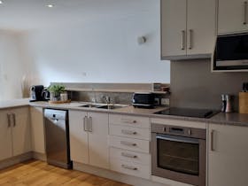 Fully Equipped Kitchen - Pantry supplies are provided as a convenience.