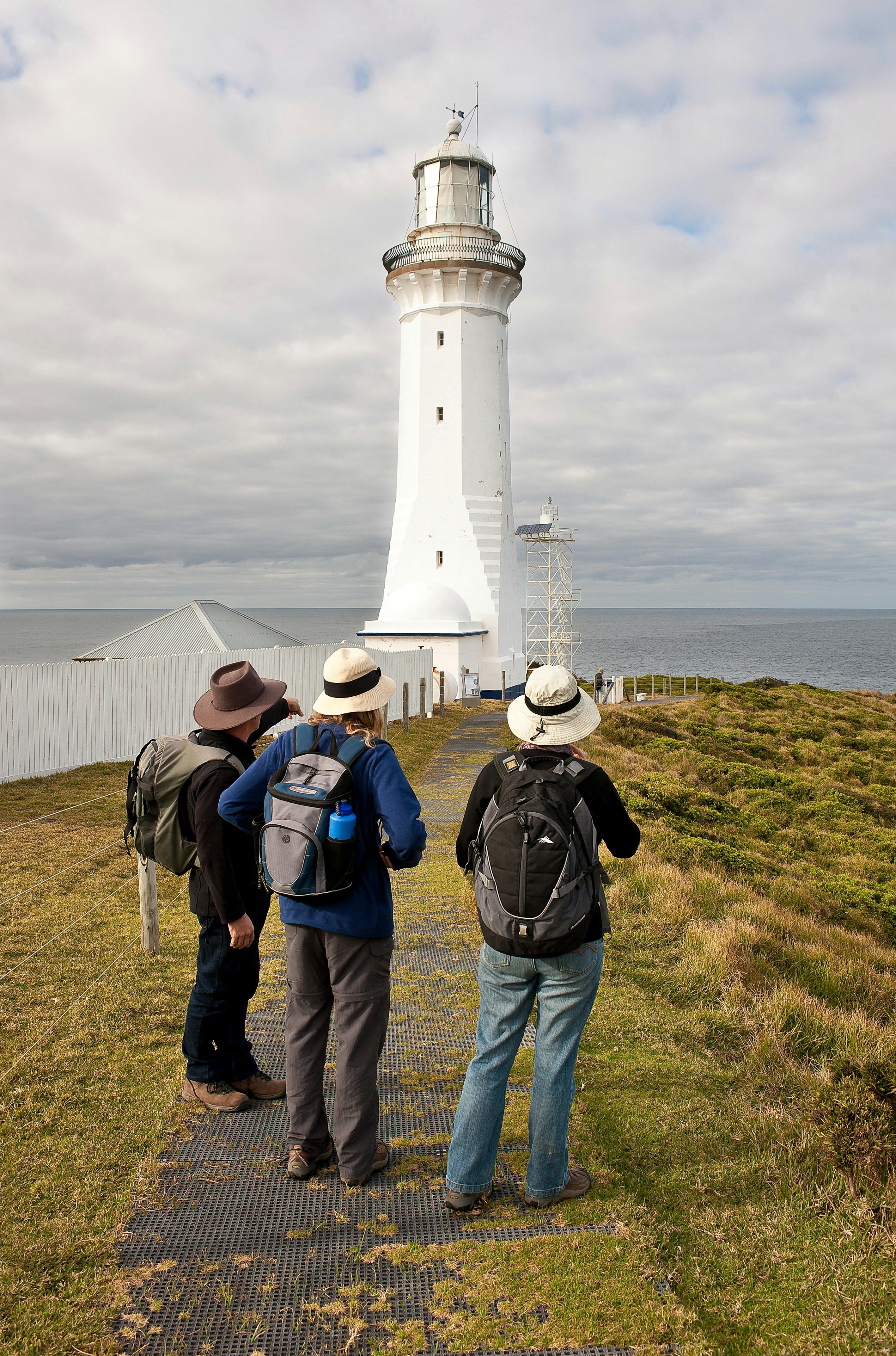 Group looking at lighthouse