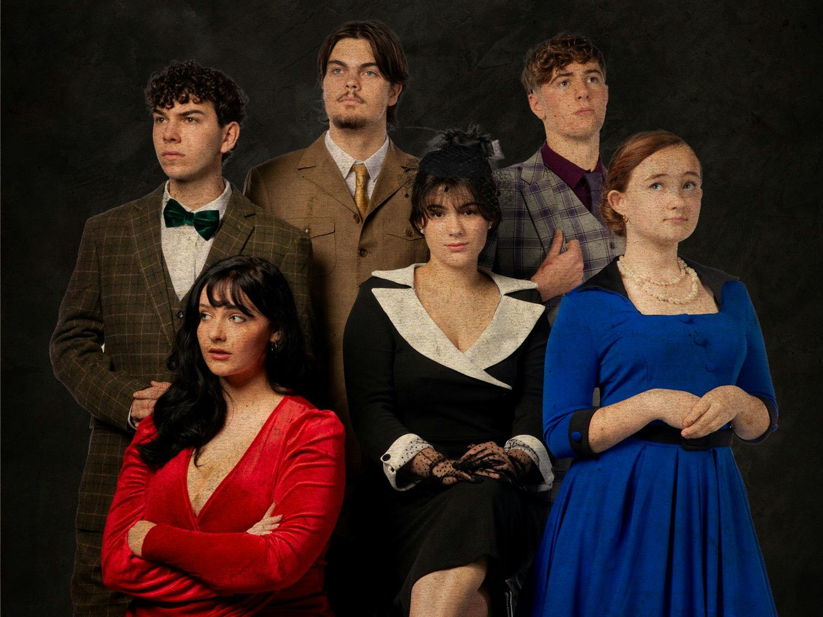 the cast of Clue posing