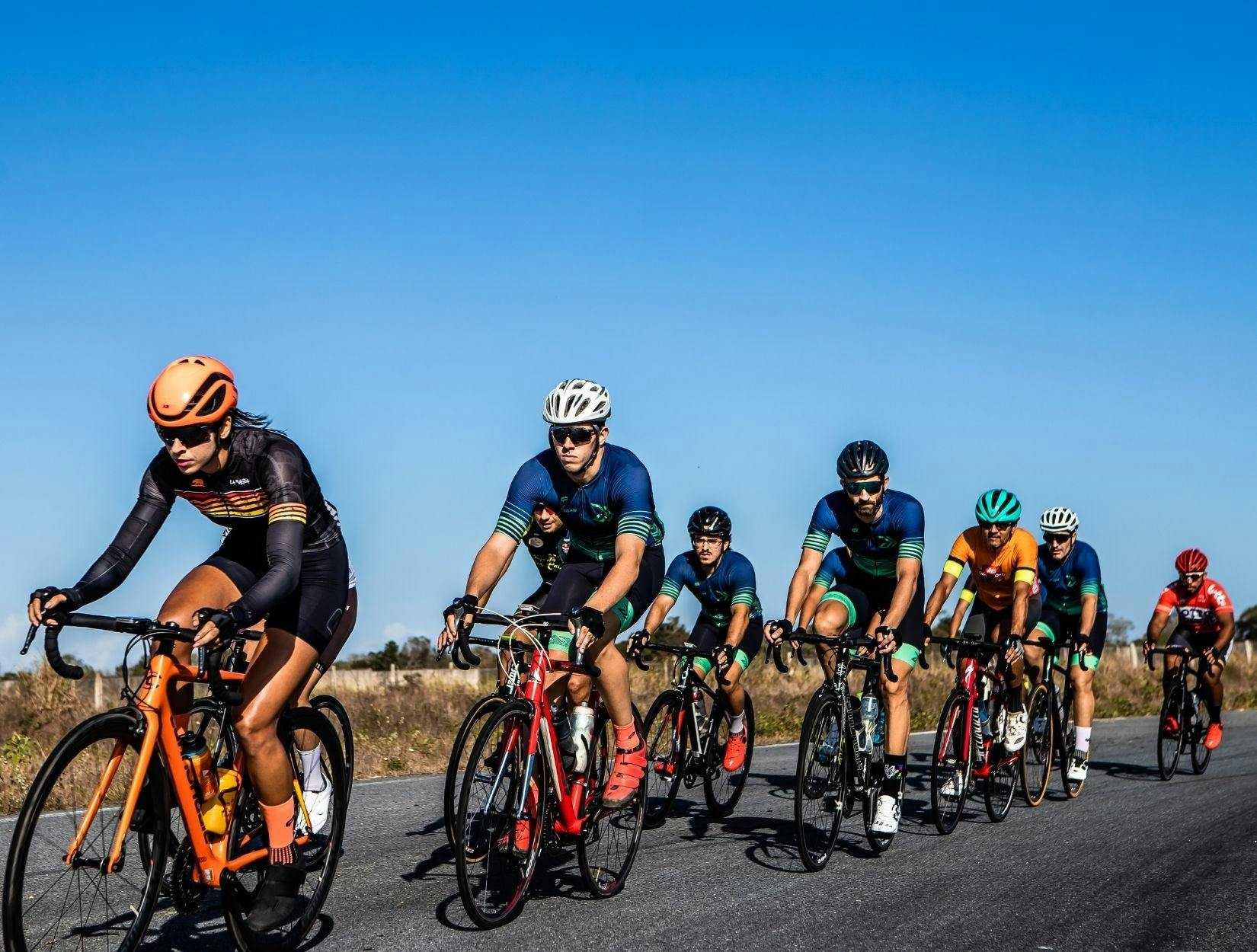 group of bike riders on a road