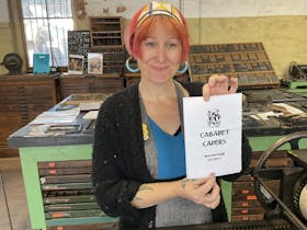 Tash with her poster at the workshop