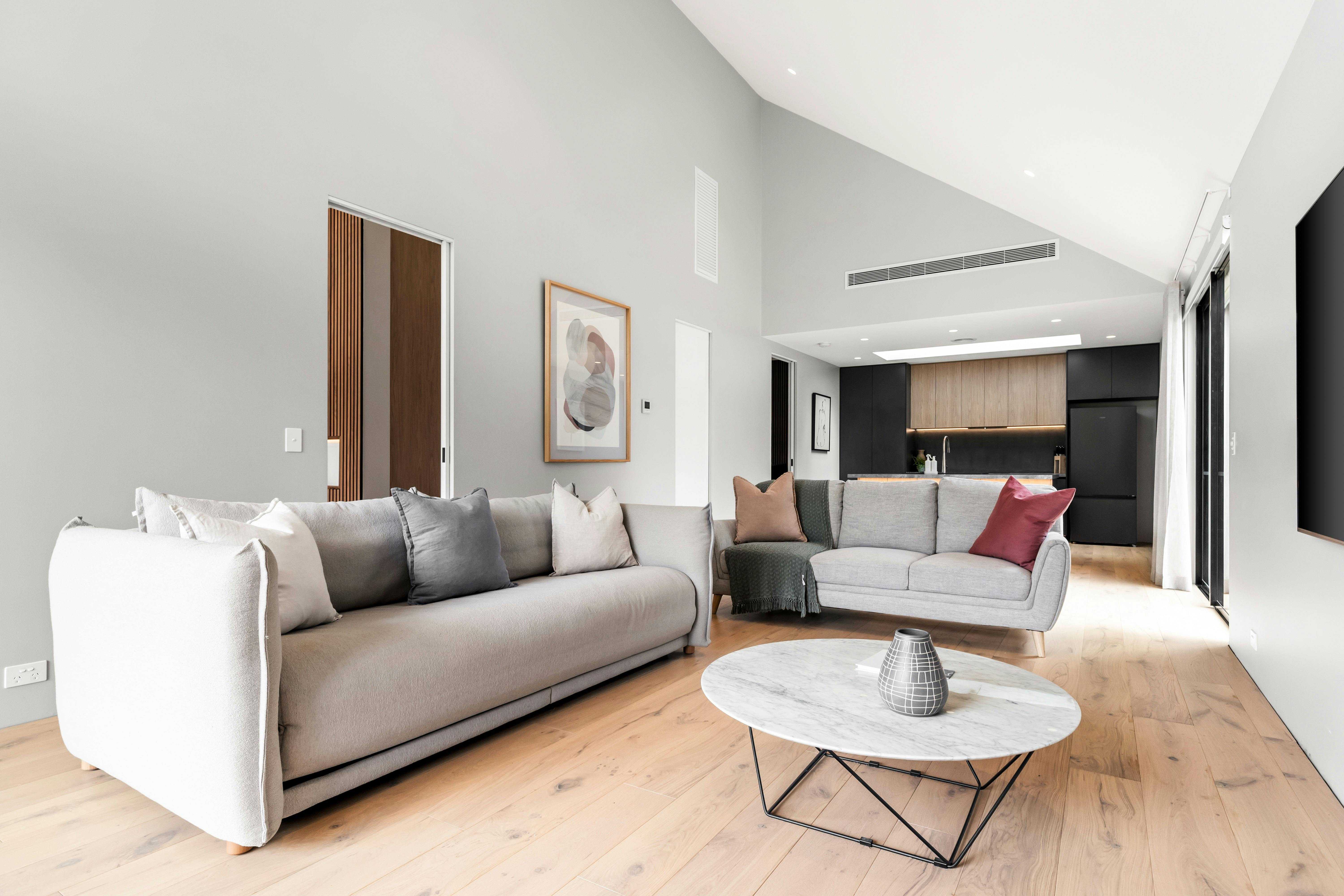 cathedral ceilings two lounge suits with 75 inch tv and fold out koala sofa