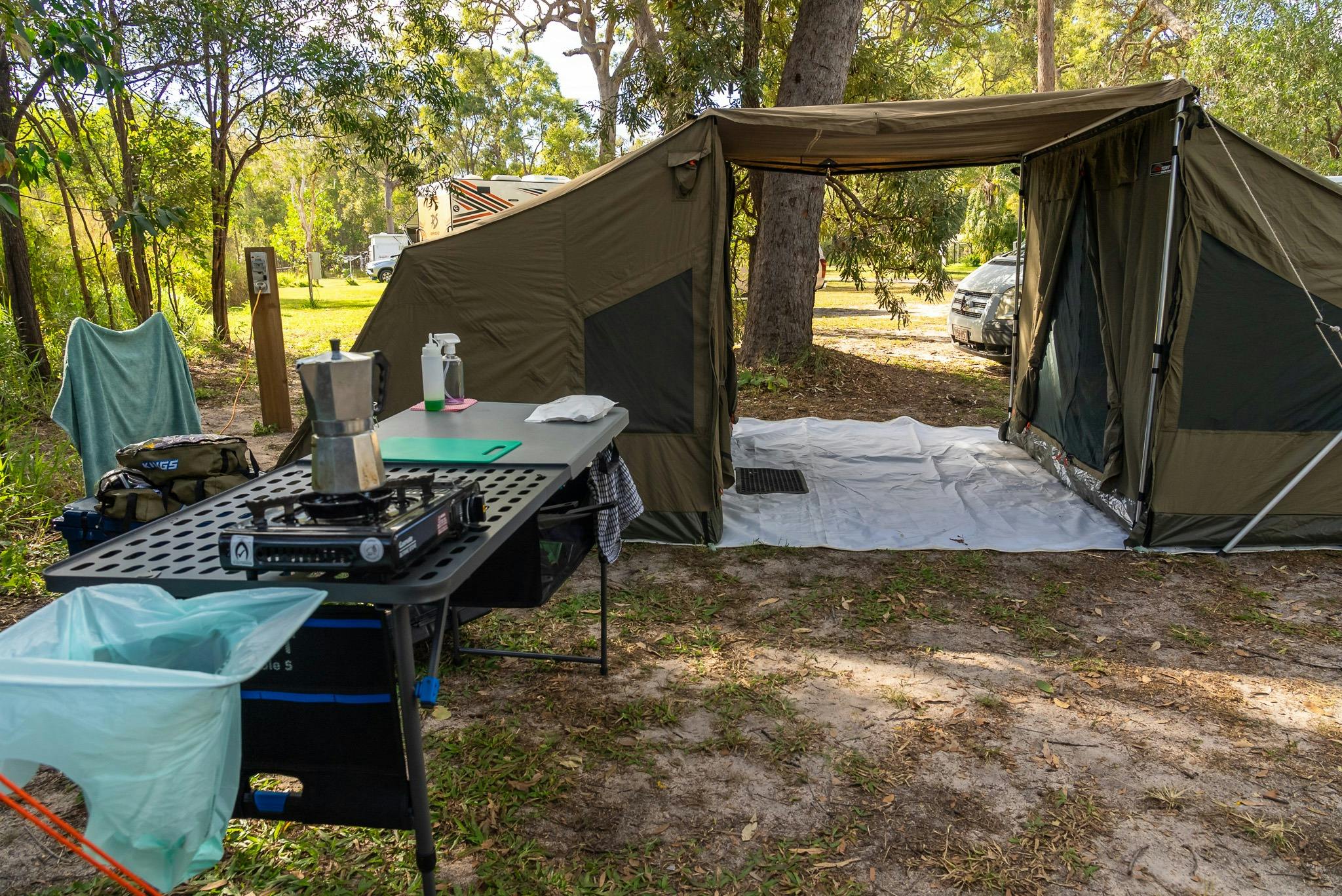 Camp kitchen with the tagalong tent in the backgroun