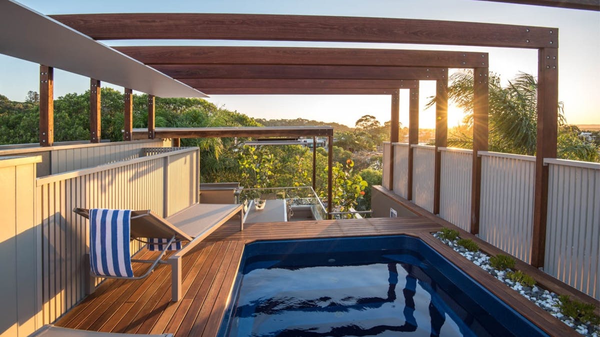 Private rooftop terrace, the crown jewel of Villa One Five, where a plunge pool and BBQ dining area