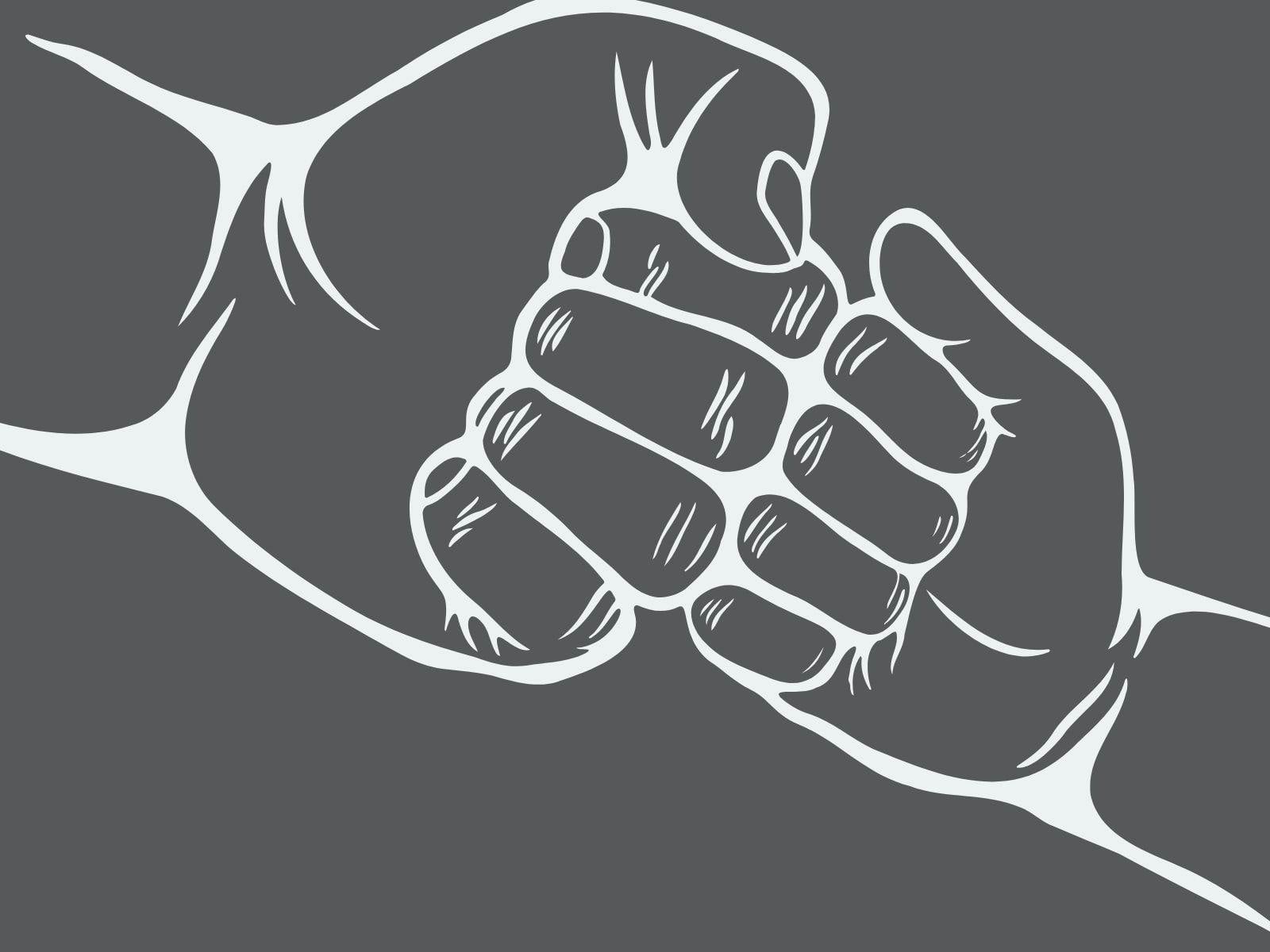 Adult and child fist bumping