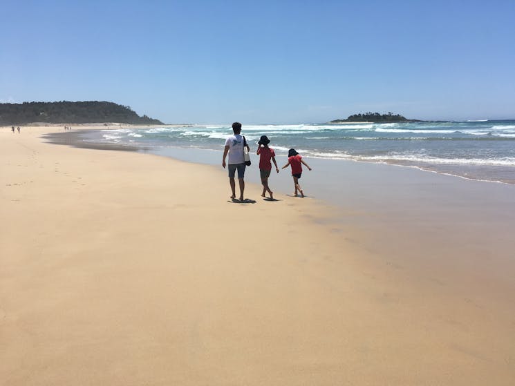 Walk along Conjola Beach.