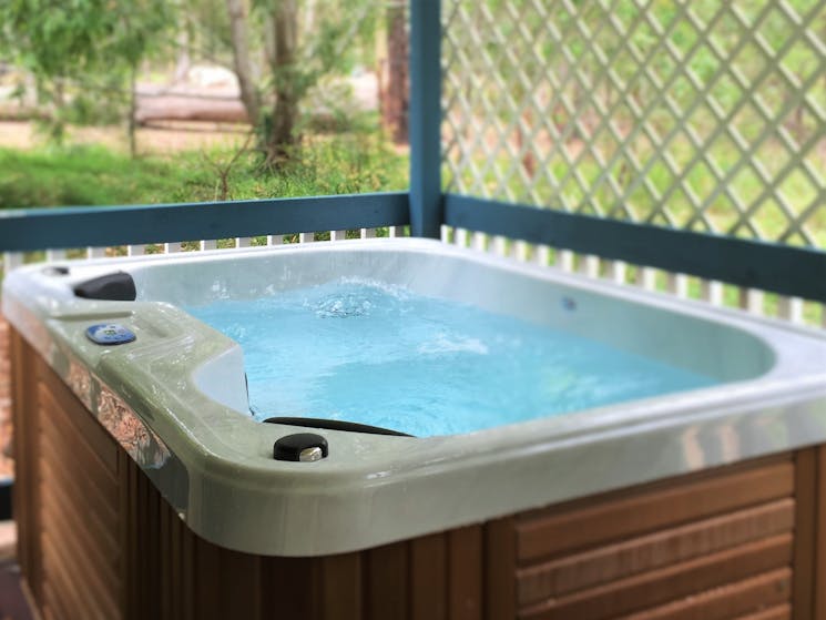 Private hot tub at each cottage