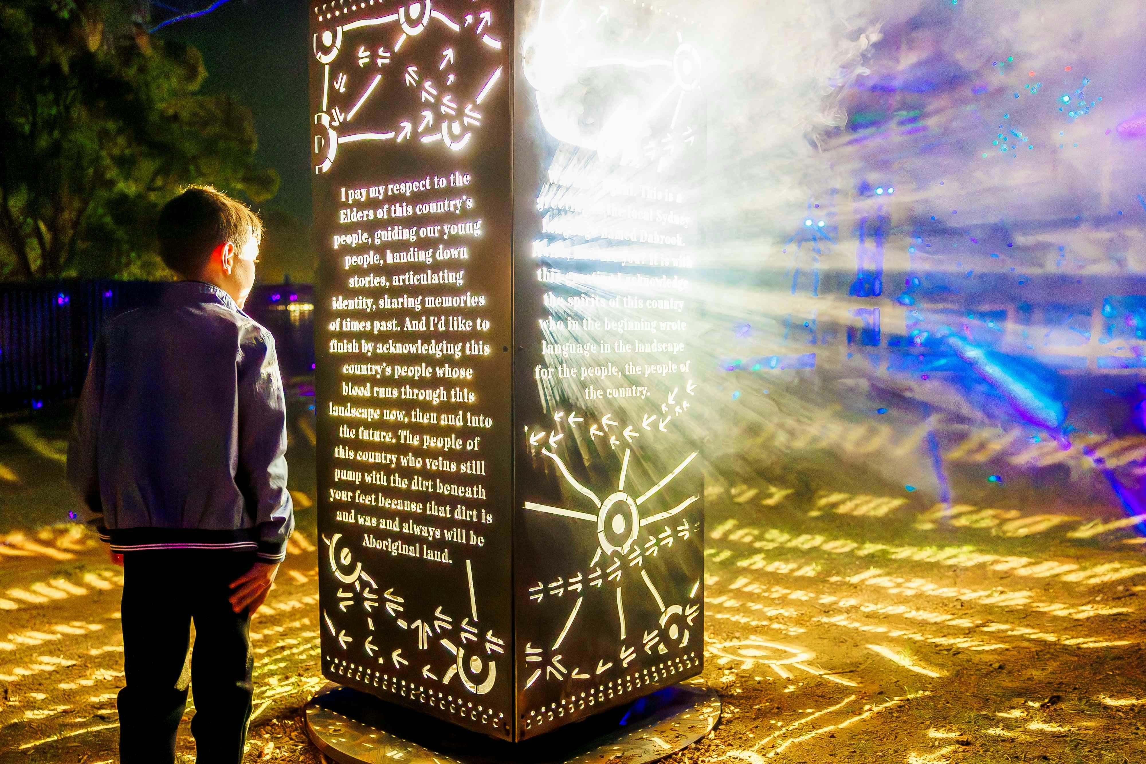 Boy at light installation