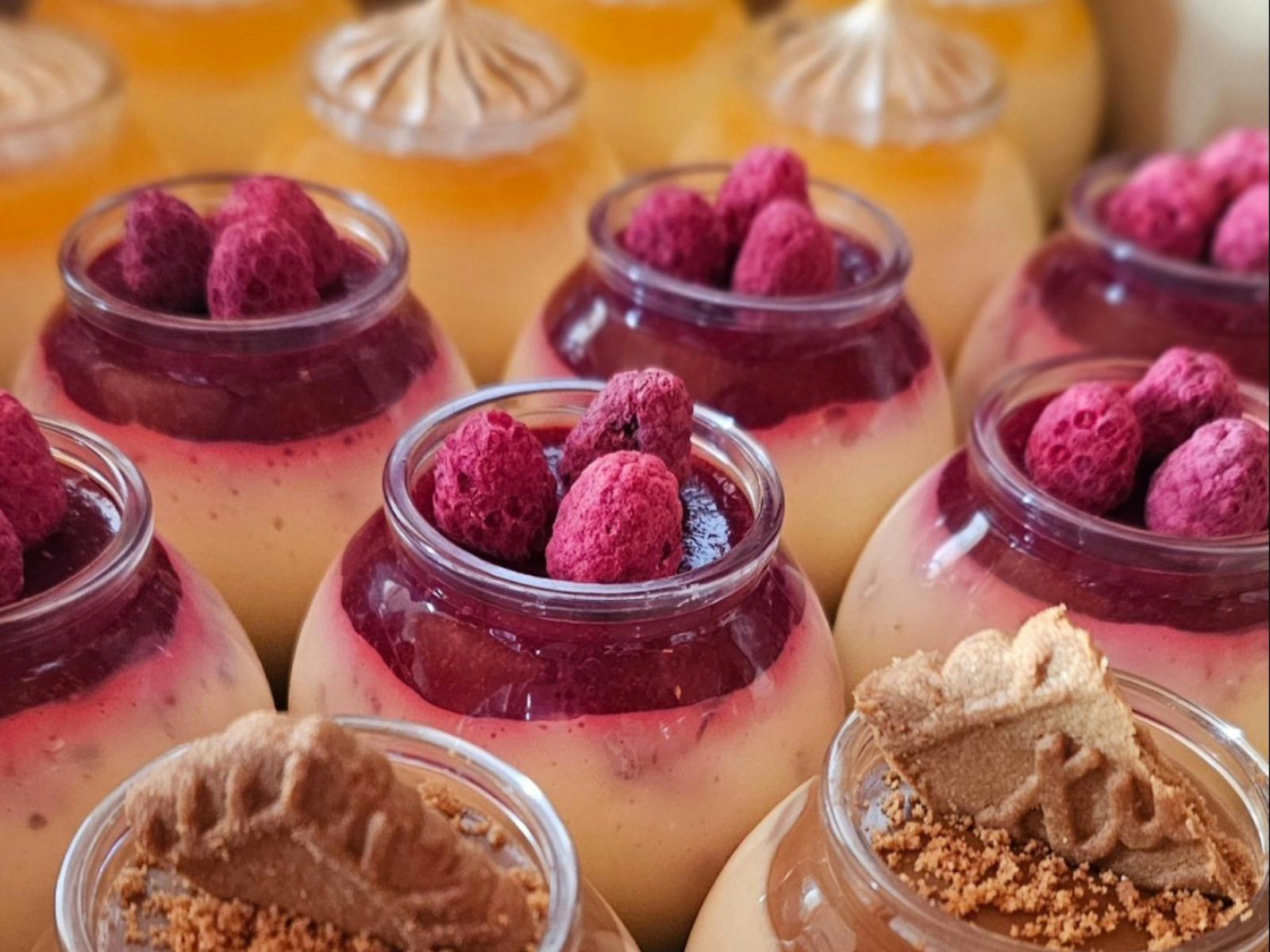 Various beautiful sweet treats in perfect lines.