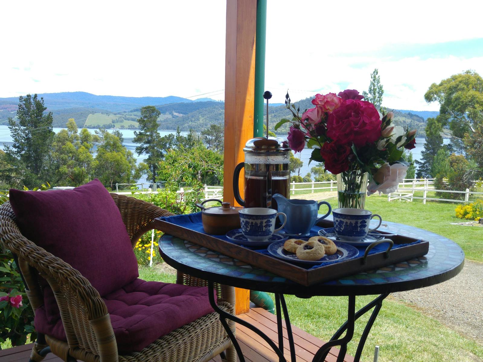 Afternoon tea on arrival with views of the Huon River and Hartz Mountains