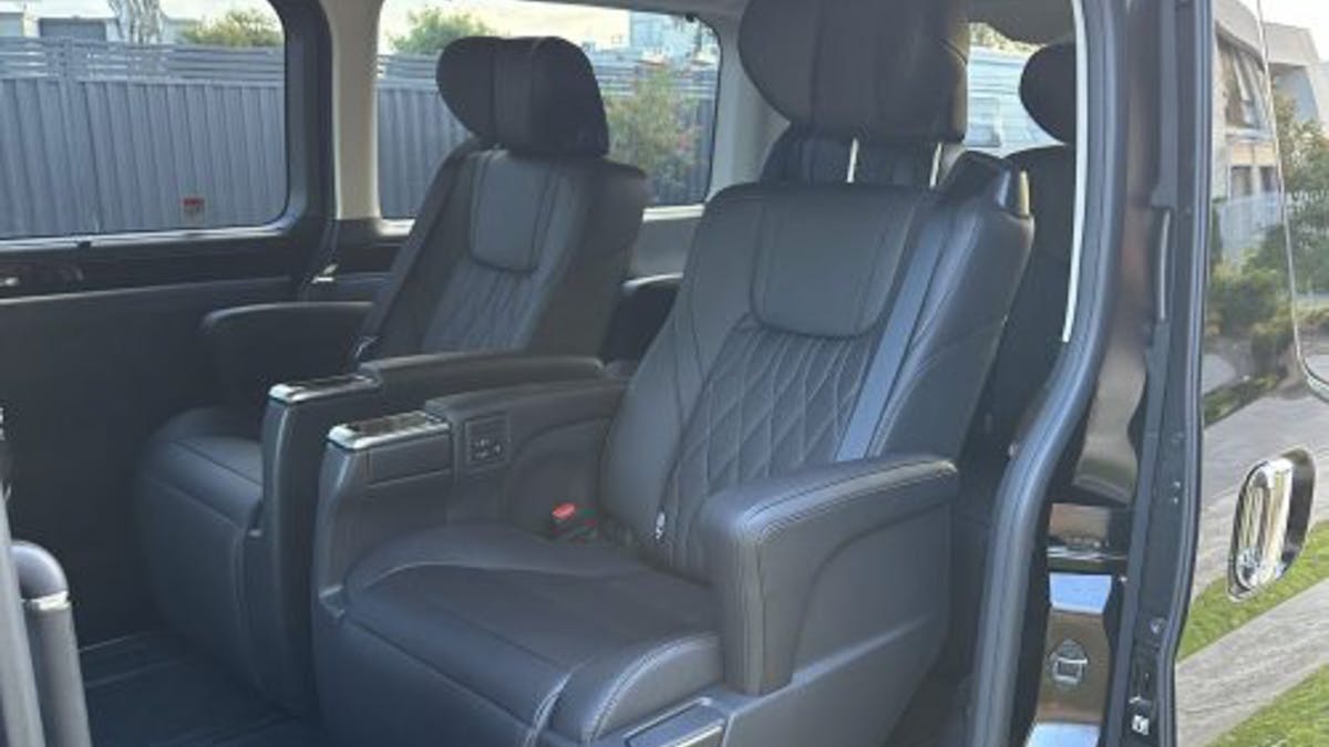 inside black van looking at seats