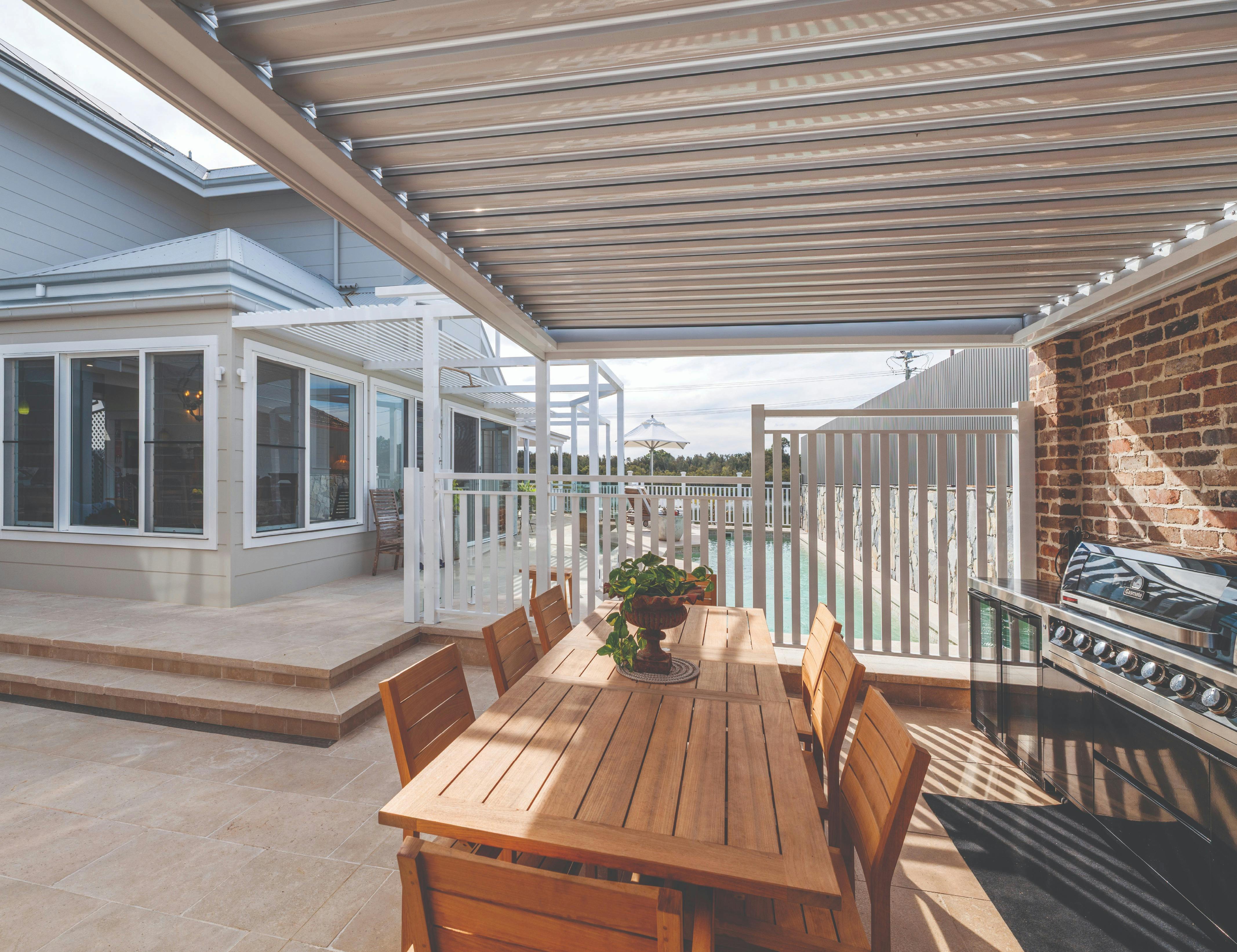 Outdoor fridge & hot water sink complement the large BBQ & gas hotplate - protected by a vergola