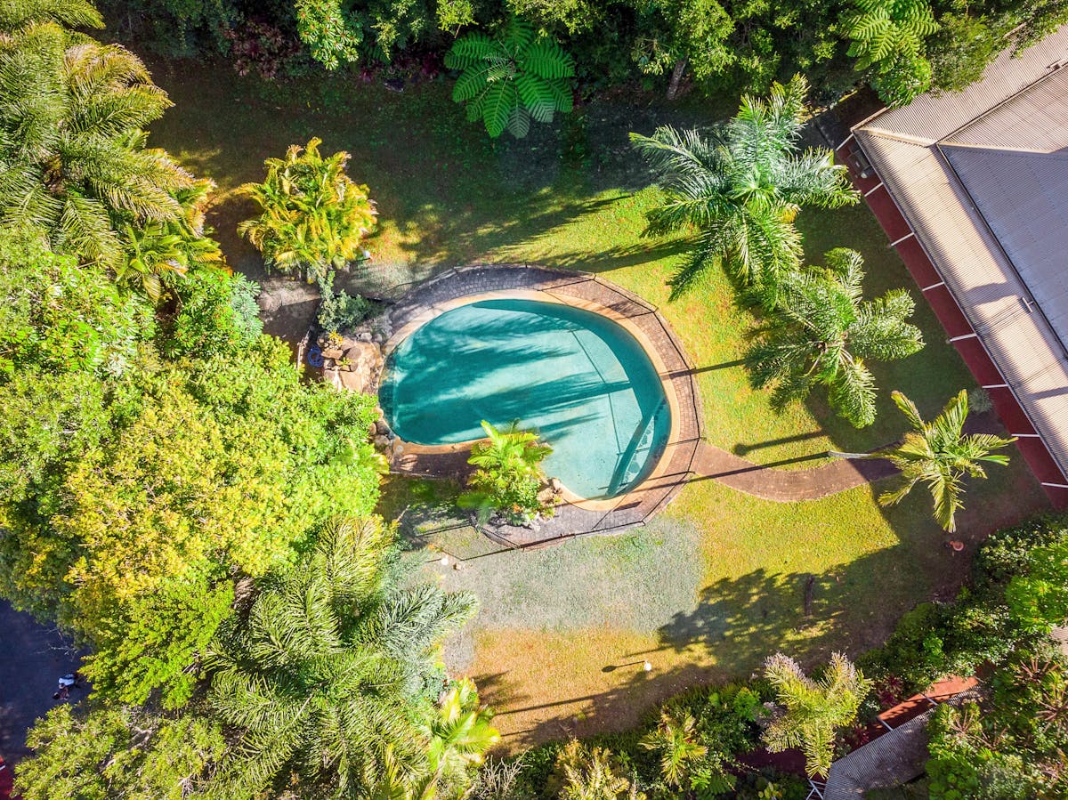 Resort style pool, waterfall and spa Malanda Lodge Motel Atherton Tablelands
