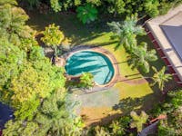Resort style pool, waterfall and spa Malanda Lodge Motel Atherton Tablelands