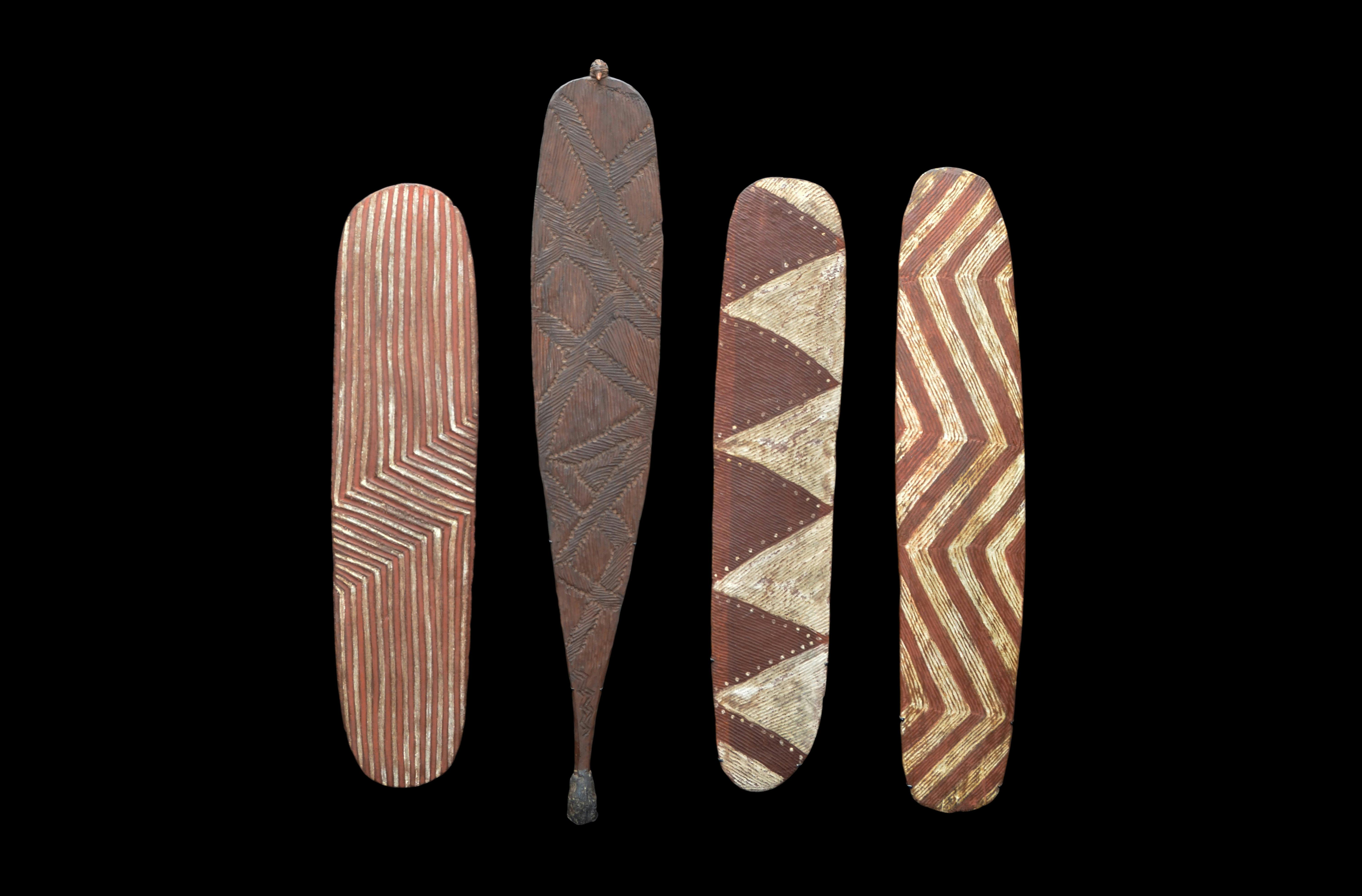 Three Austrlaia Aboriginal Shields and One Spear Thrower. Tribal Art Collection