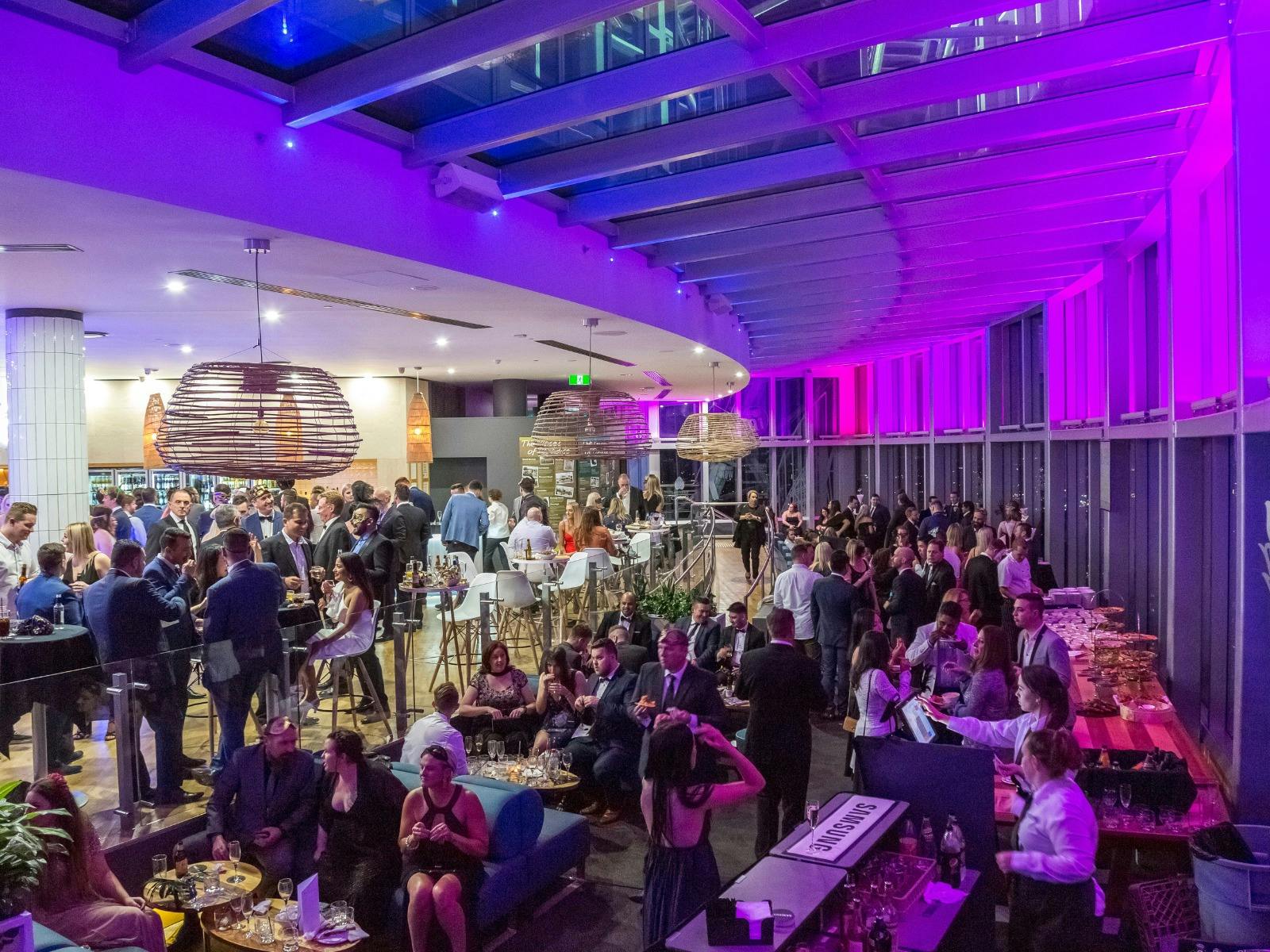 A gathering of people celebrating NYE at SkyPoint