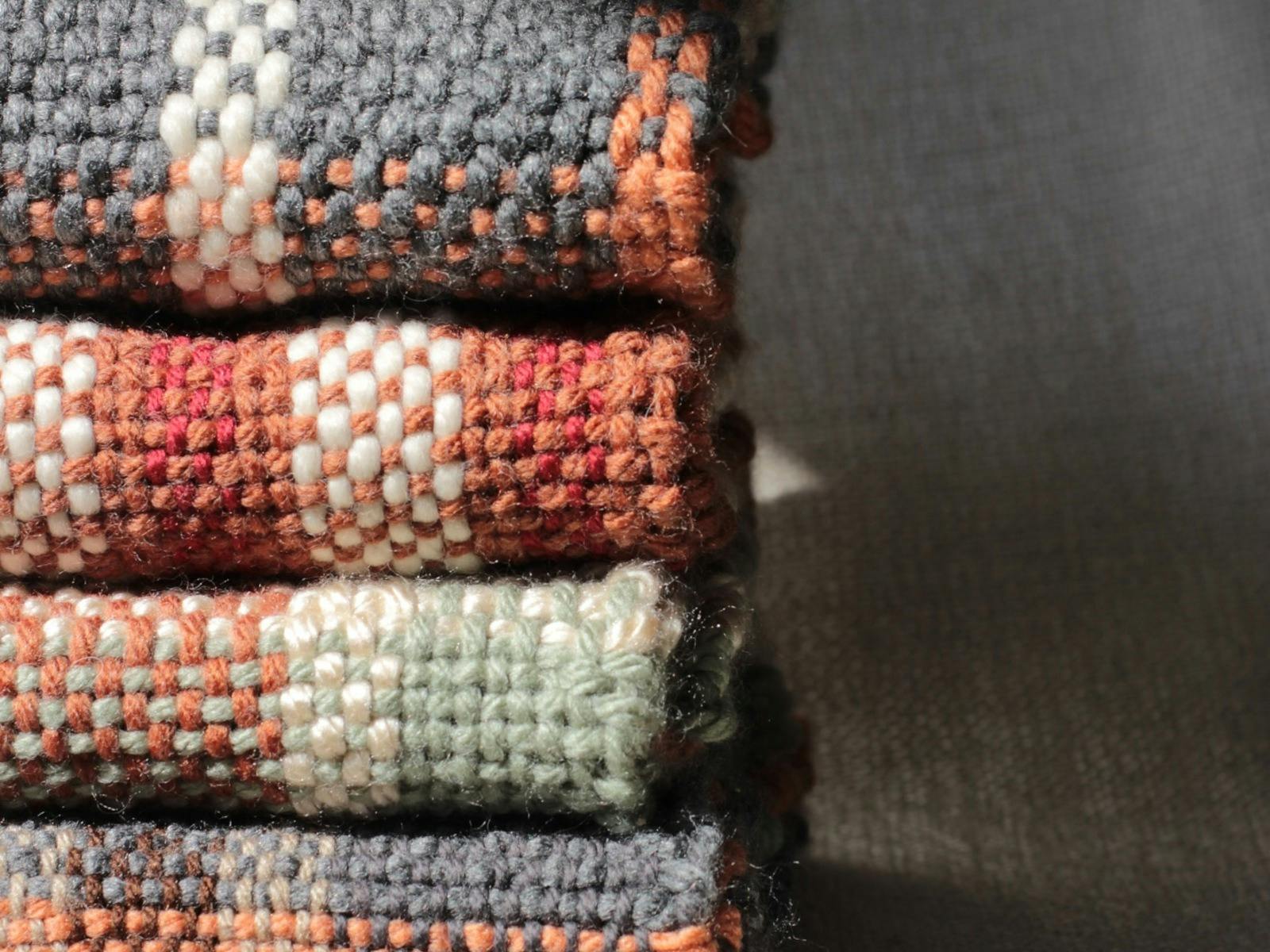 checked scarves in a stack