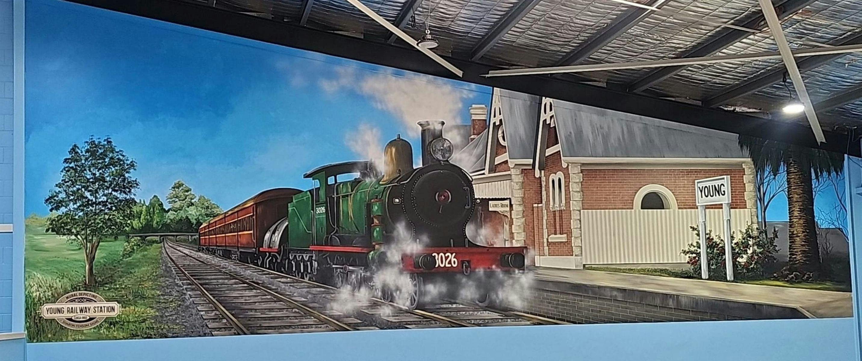 Mural of Young Railway Station with a steam train.