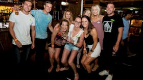 Fun group of girls and guys on pub crawl in surfers paradise