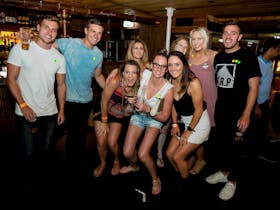 Fun group of girls and guys on pub crawl in surfers paradise