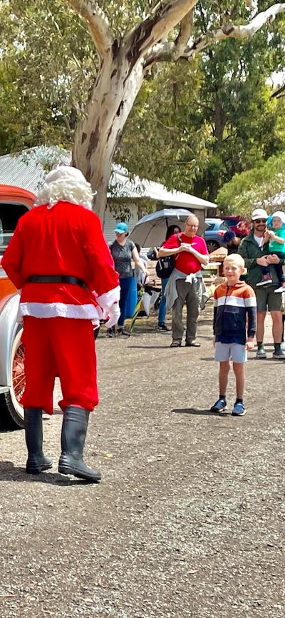 Santa and vintage classic car