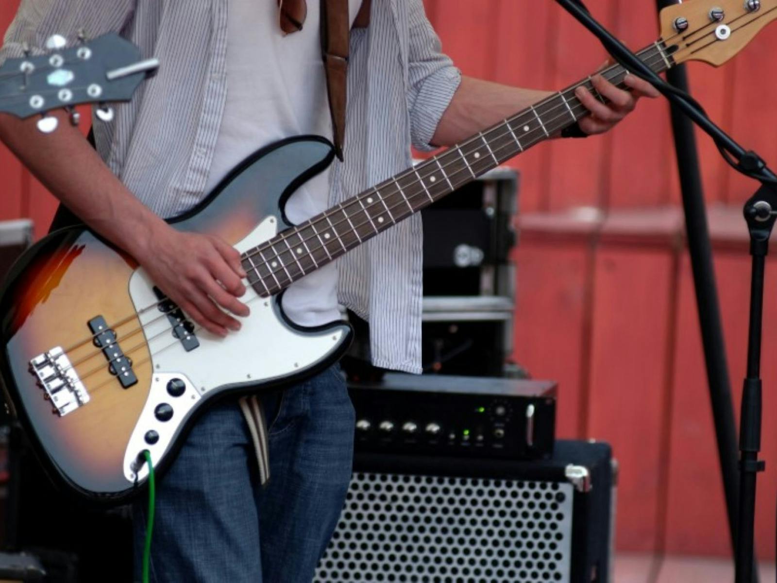 Image of a guitarist performing on stage