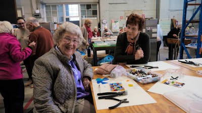 Visitors during tile making class