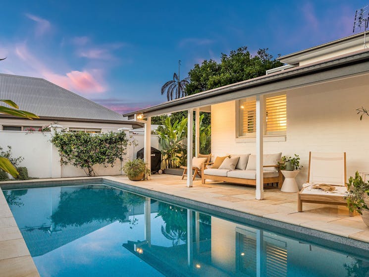 Shutters at Byron - Byron Bay - Pool and Outdoor Seating at Sunset