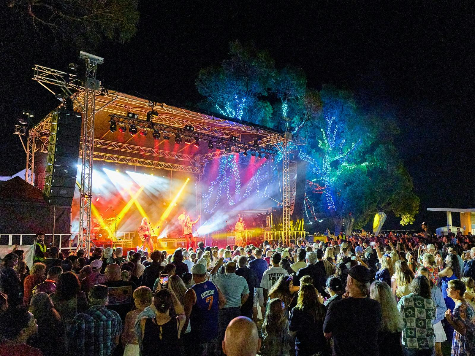 Stage featuring live music and colourful lights