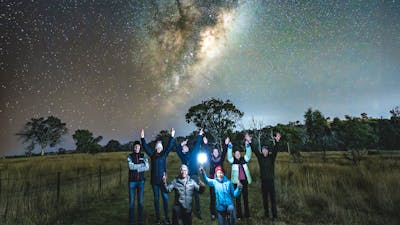 Portrait of photographers under the Milky Way