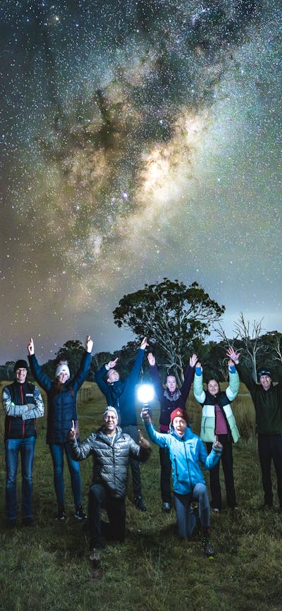 Portrait of photographers under the Milky Way