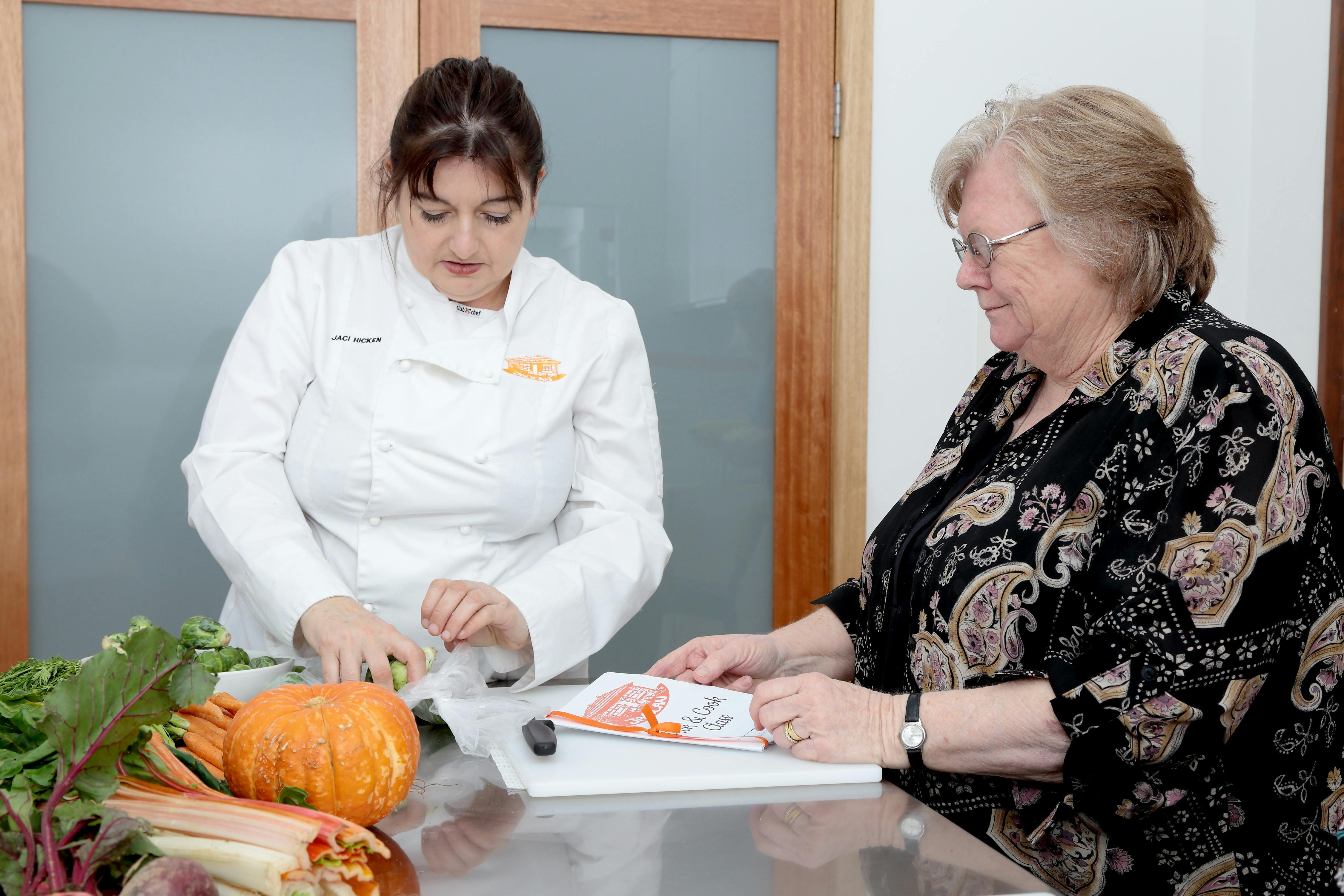 Jaci Hicken, chef teaching guests how to preserve garden produce