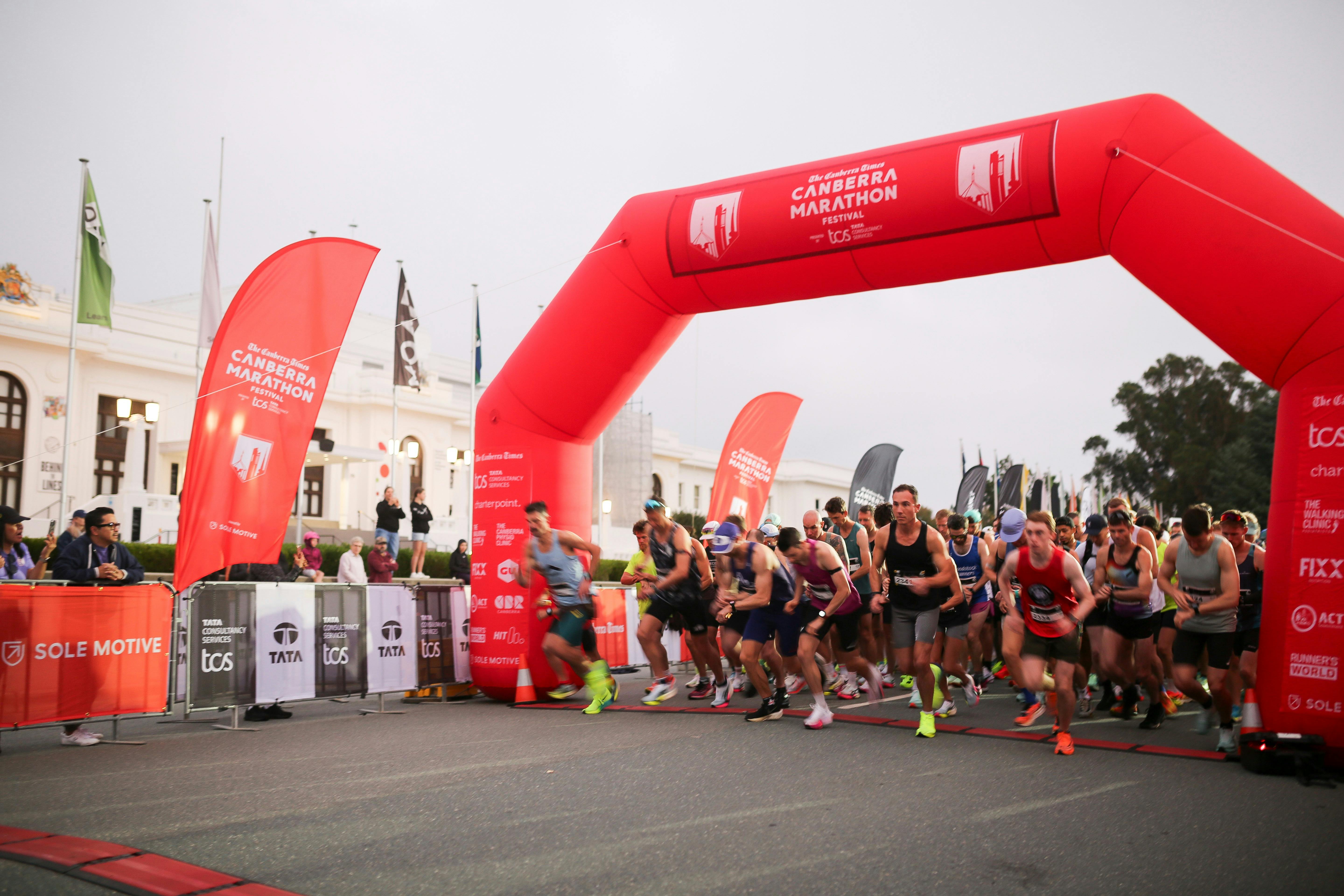 Participants crossing the start line