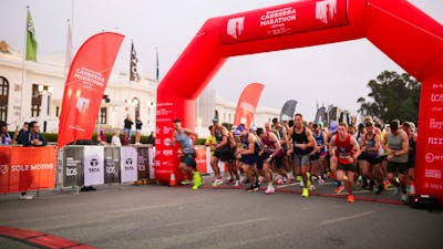 Participants crossing the start line