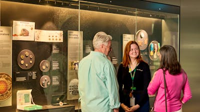 Couple on a free guided tour at the Mint