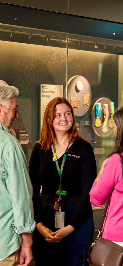 Couple on a free guided tour at the Mint