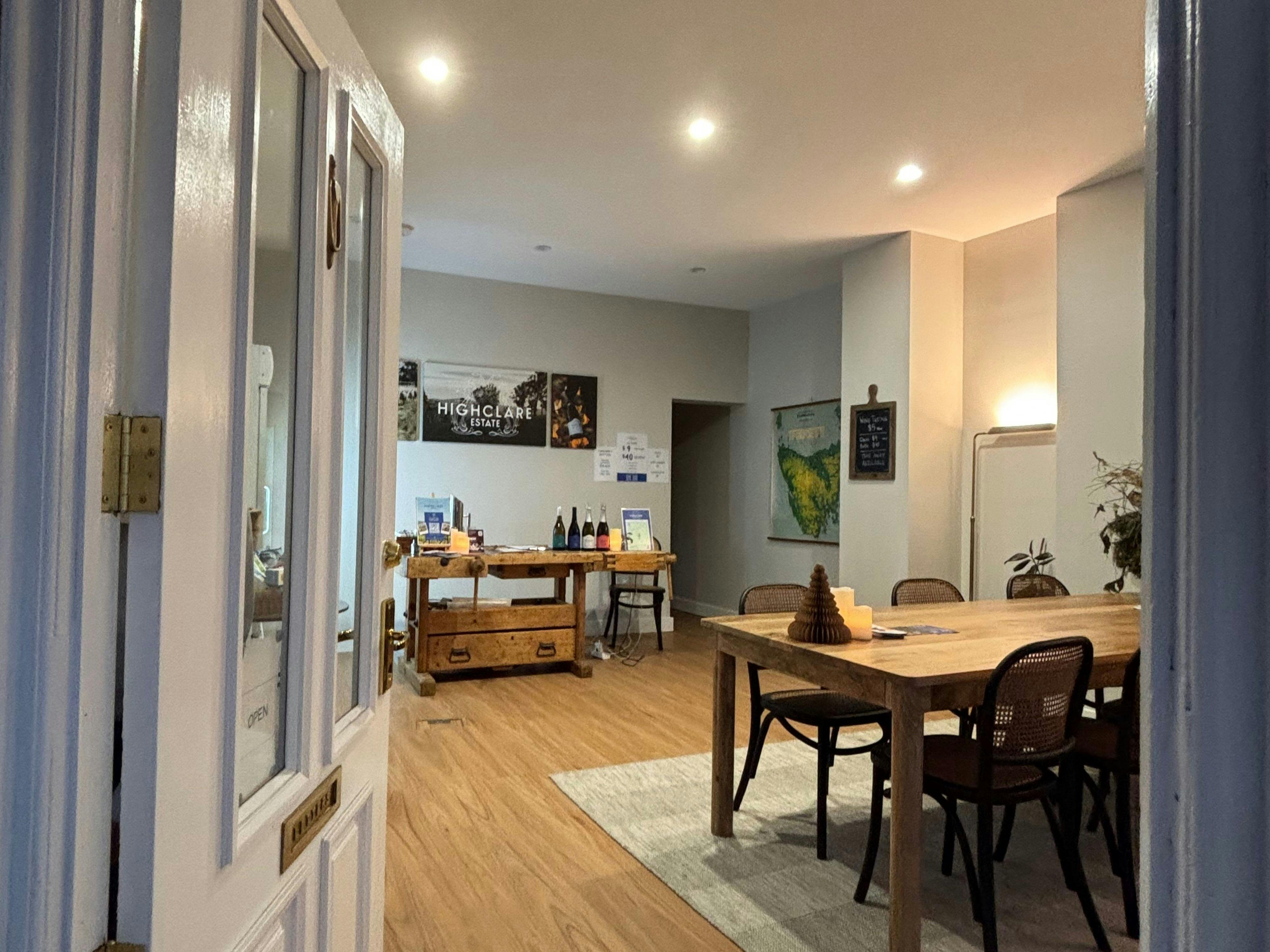 Entry view from the doorway of the Wine Room, bench and group table