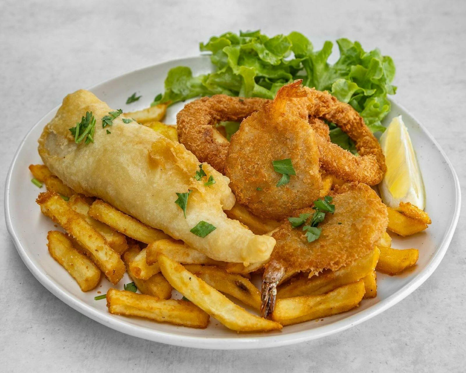 Blue Fin & Marina Seafood overlooking the sparkling waters at the Marina