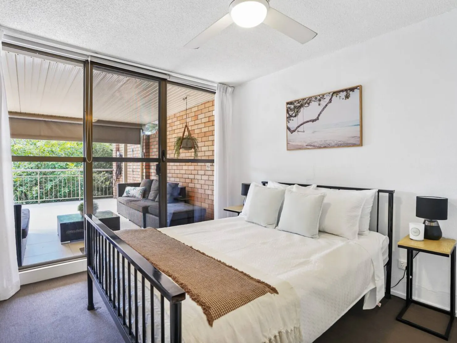 Main double bedroom with walk-in wardrobe and main balcony access