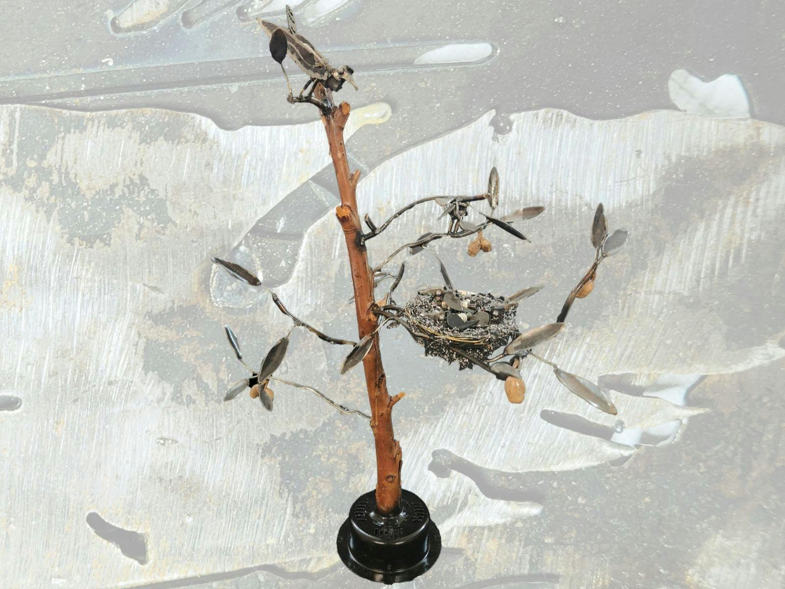 Nest and Birds 2024 wood, recycled metal, cut out metal, metal shavings and gum nuts