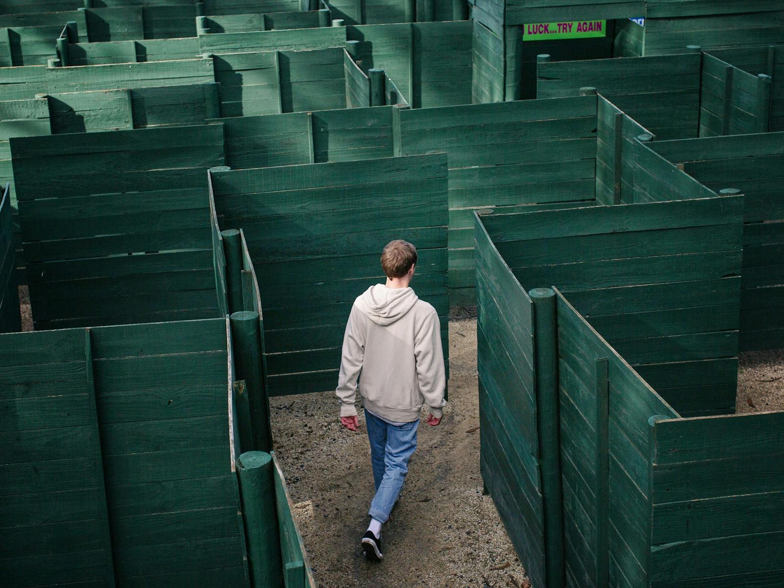Guest finding their way through the giant maze at A Maze'N Things