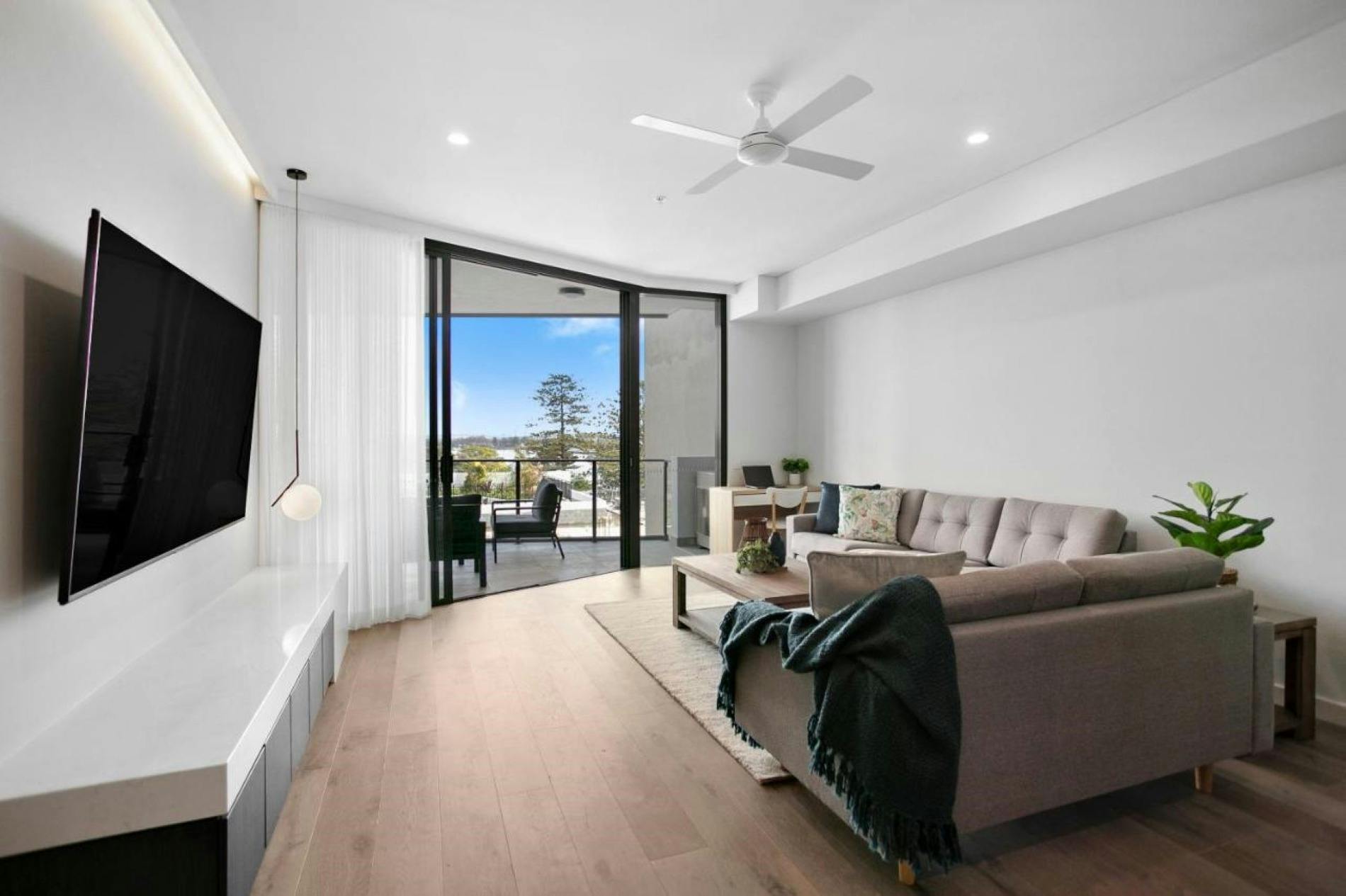 Lounge area leading out to balcony