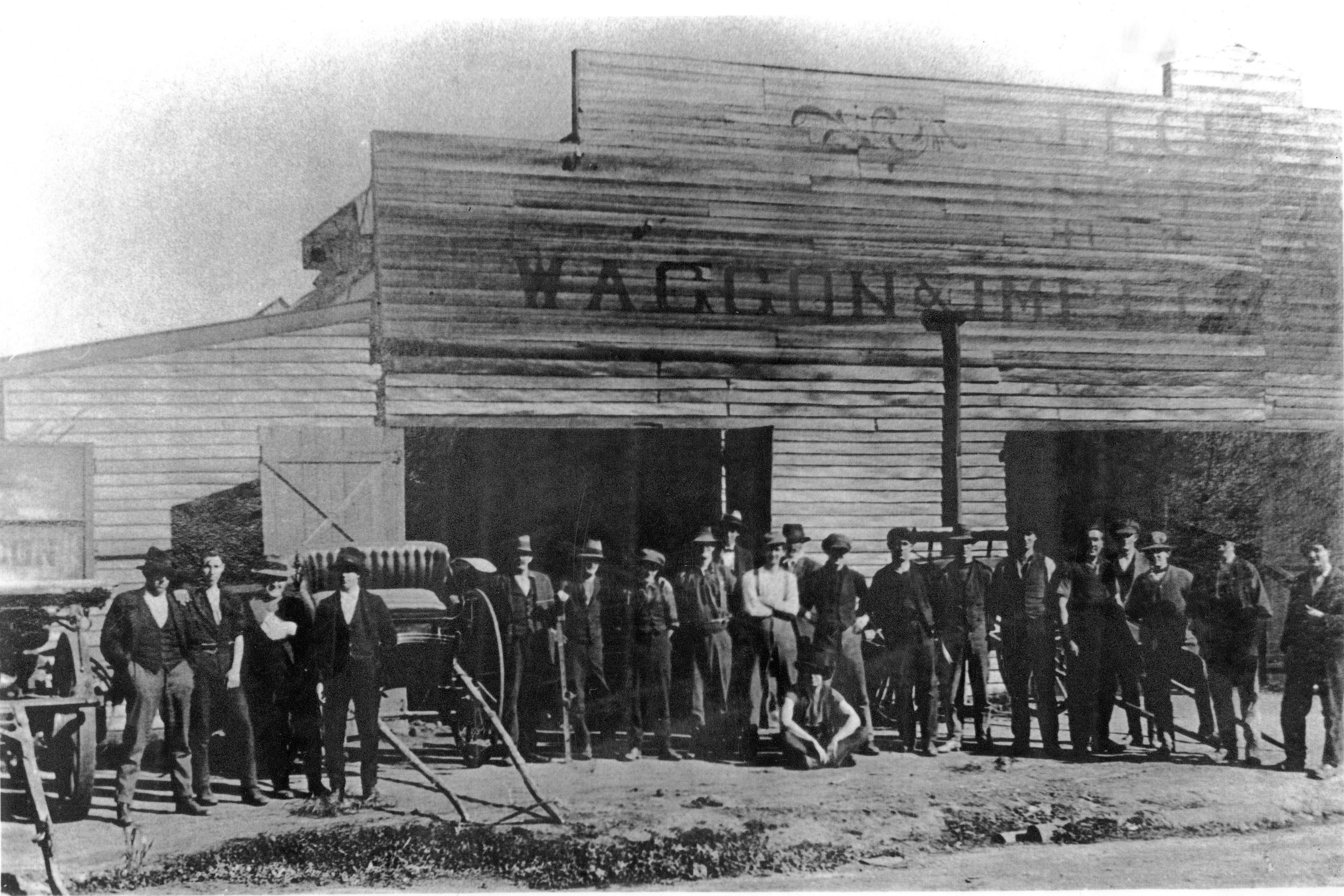 Employees of JT Close 1920 outside of workshop