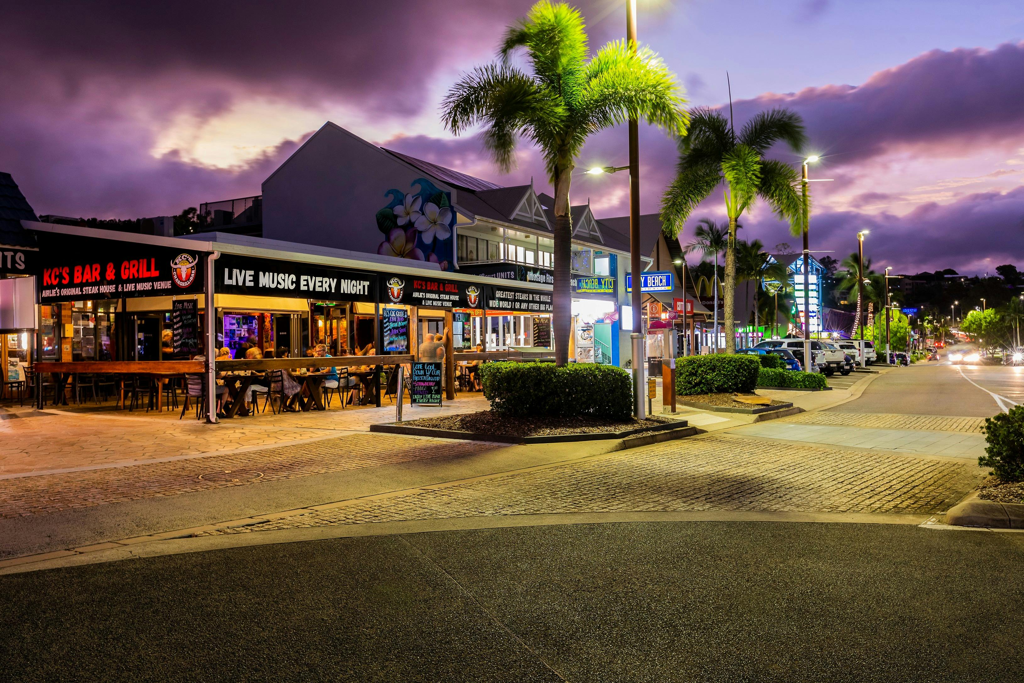 Dining along Airlie Beach main street evening time