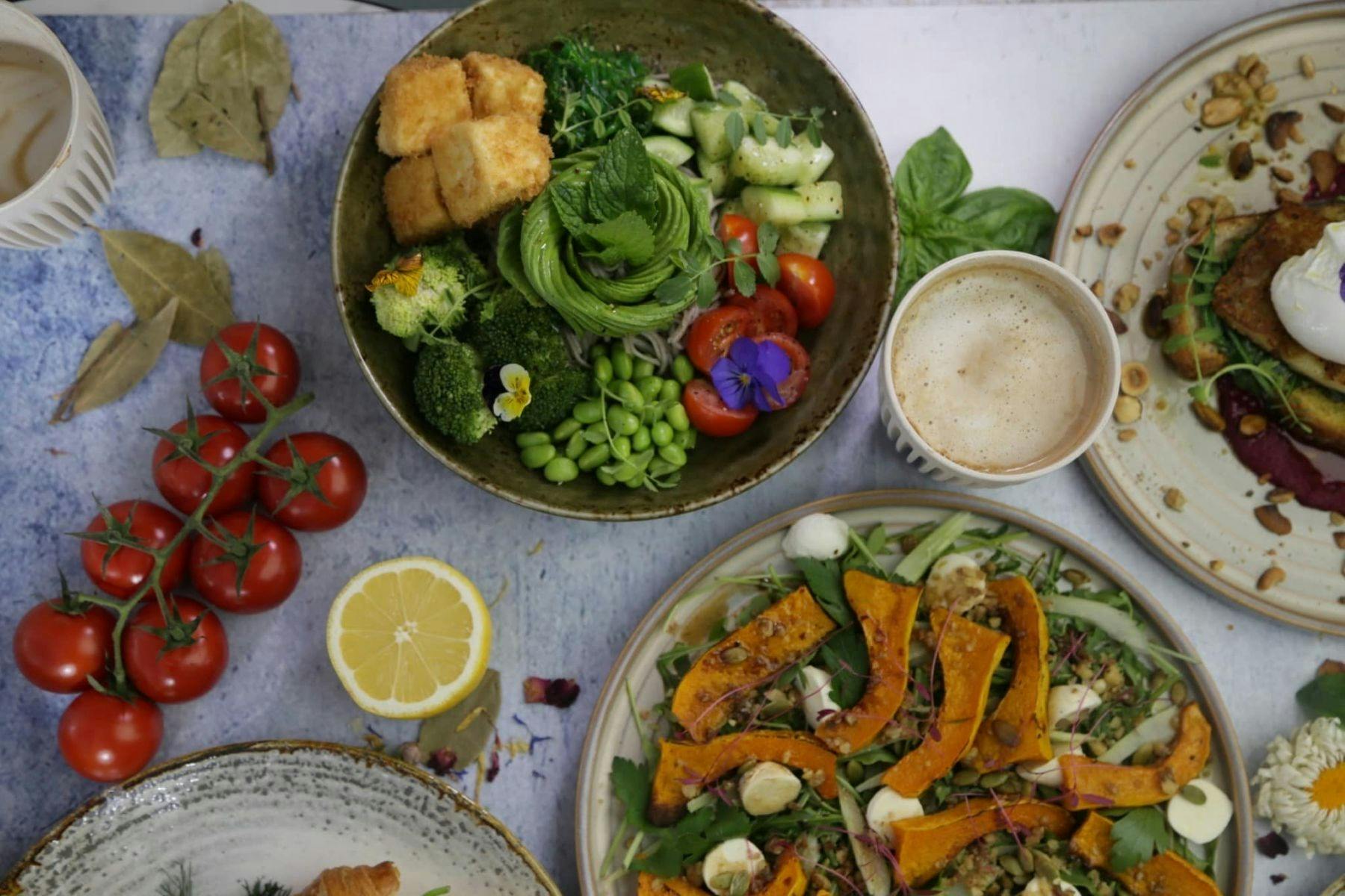 Mixture of lunch plates including a variety of fresh vegatables, fresh truss tomatoes & pumpkin.